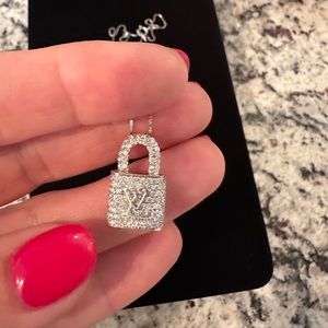 14 karat white gold and diamond pendent